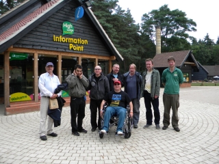 The new wheelchair being admired by the Monday Volunteers and Forestry Commission staff
