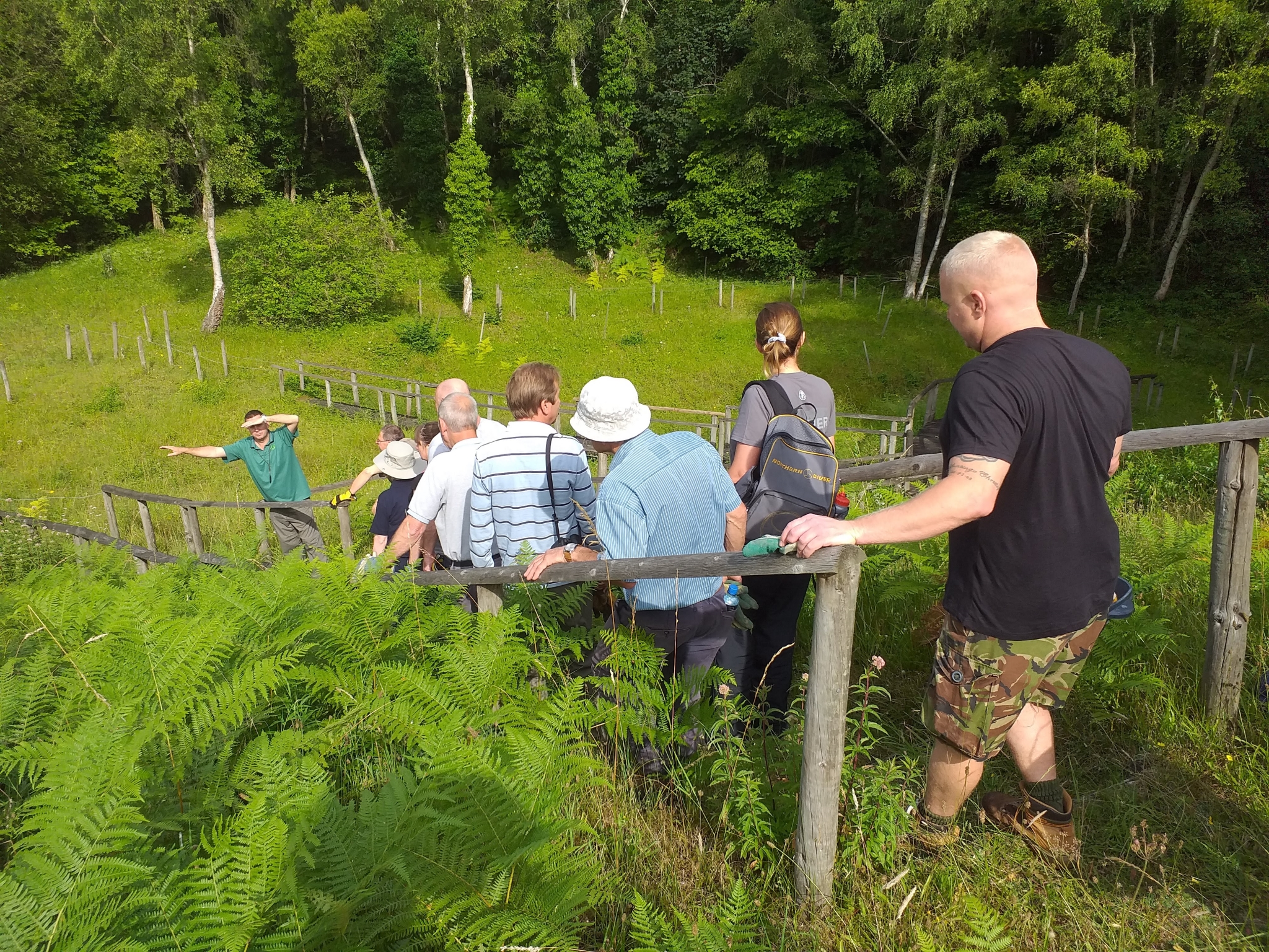 A photo from the FoTF Conservation Event - July 2019 - Weeding at Rex Graham Reserve : Volunteers descend into Rex Graham Reserve