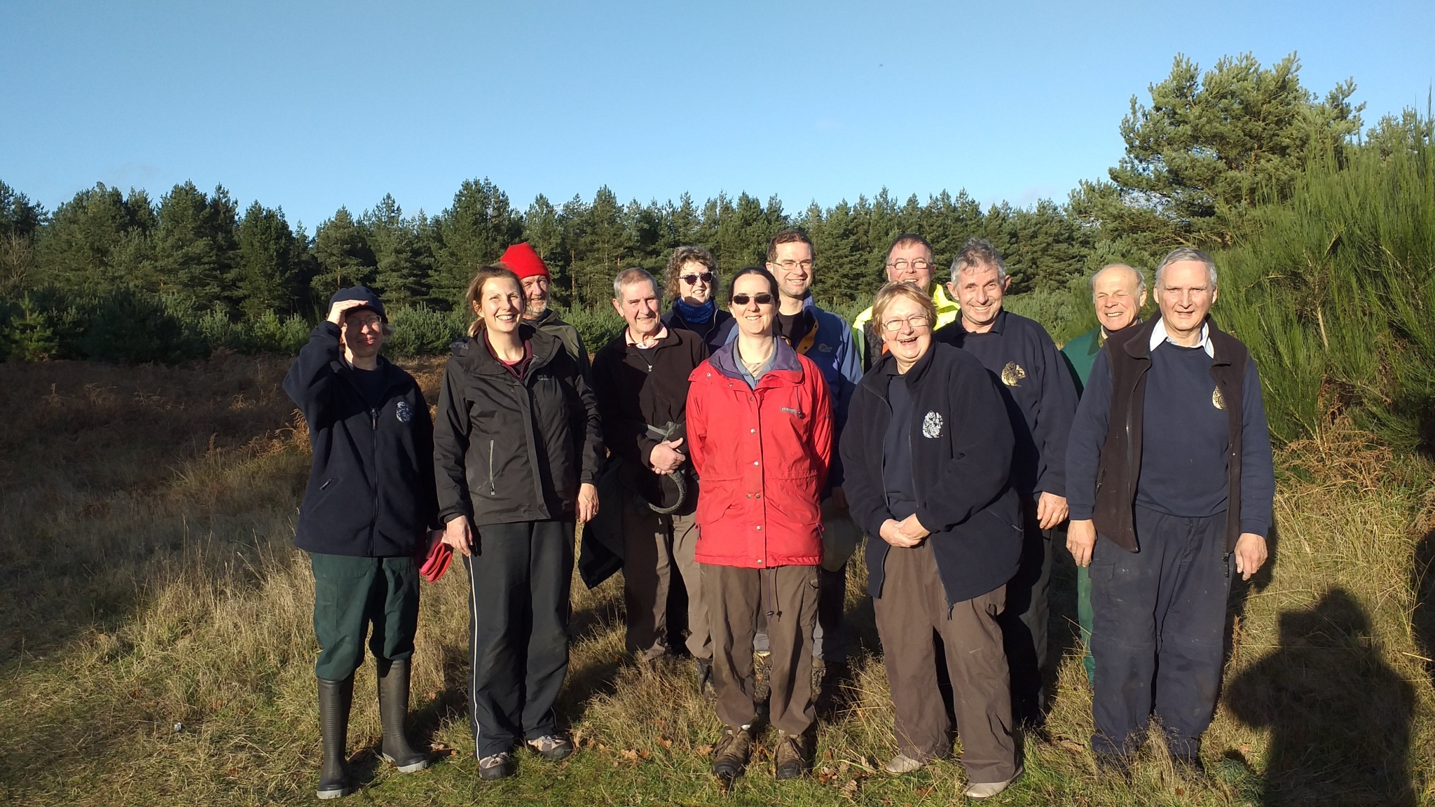 A photo from the FoTF Conservation Event - December 2019 - Self Seeded Pine Tree Removal on the Goshawk Trail : A group photo of the volunteers