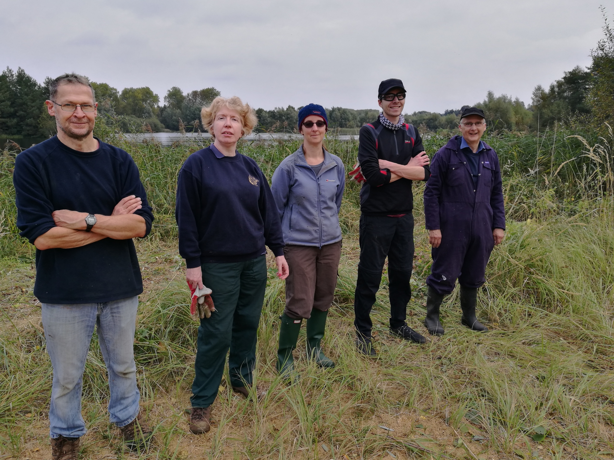 A photo from the FoTF Conservation Event - October 2021 - Coppicing and collecting material for wildlife screen : A group photo of some of the FoTF Conservation volunteers who attended