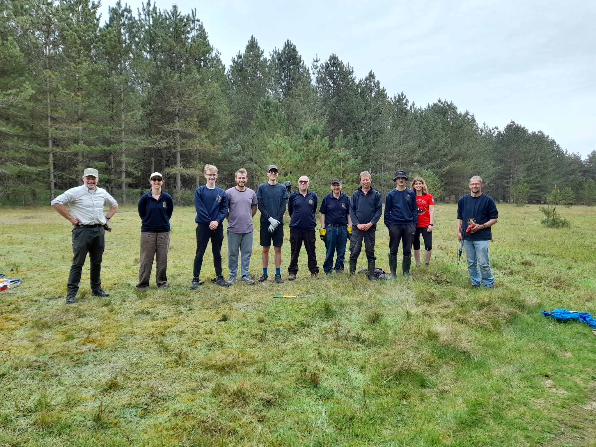 A photo from the FoTF Conservation Event - May 2022 - Self Sown Fir Removal at Kings Forest : A group photo of volunteers at the event